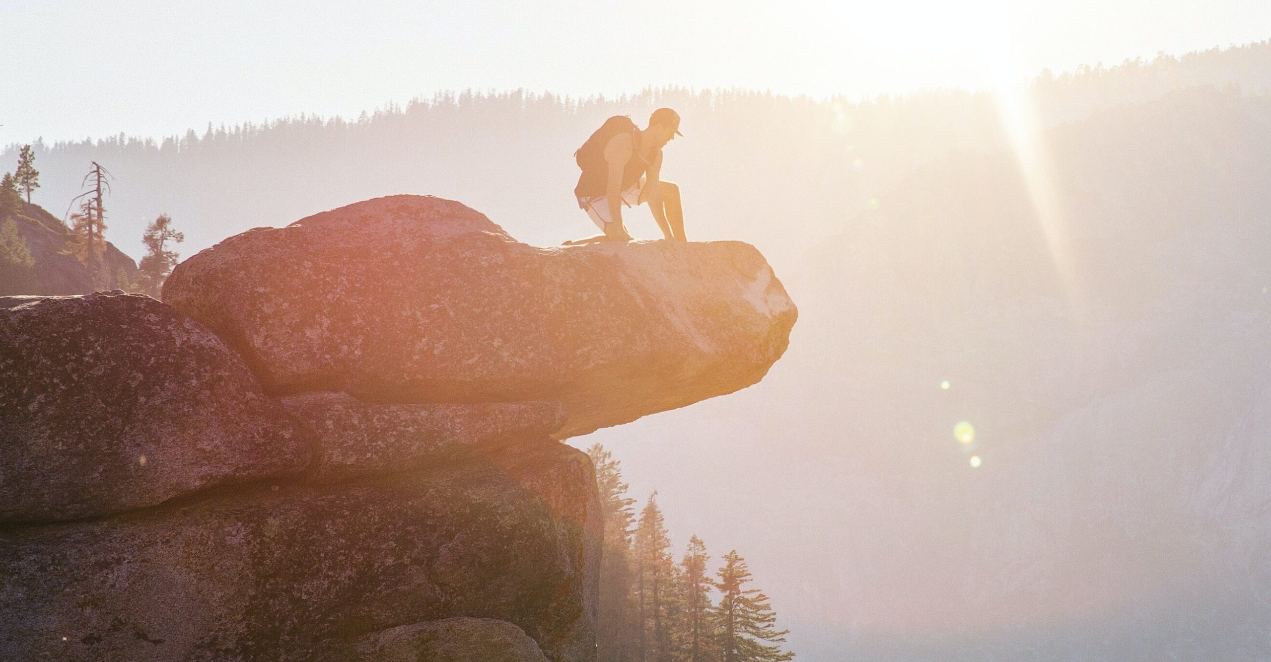 Man on top of a rock